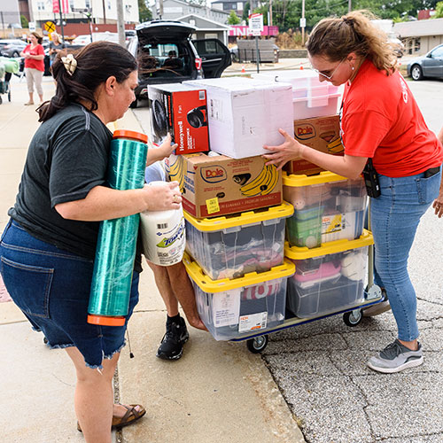 Parents helping students moving-in